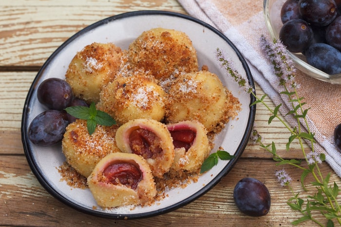 bigstock-Typical-Austrian-Plum-Dumpling-250682023-min